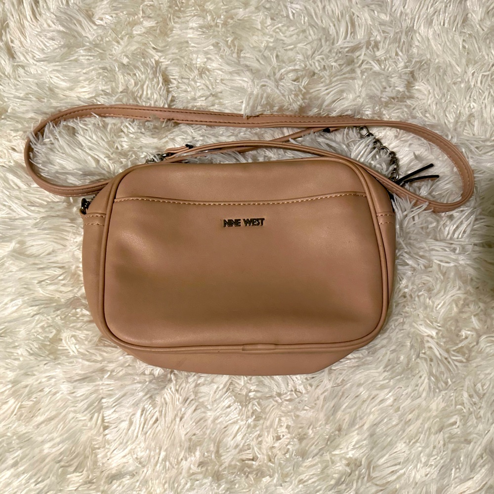 Pink Nine West hand bag.
